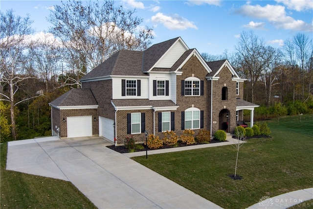 view of front facade with a garage and a front yard