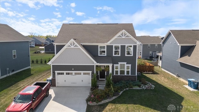 view of front of house with a garage, cooling unit, and a front yard