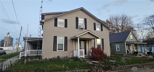 front facade featuring cooling unit