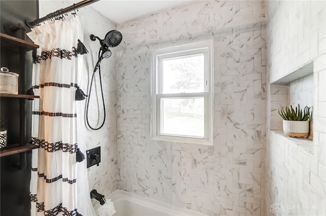 bathroom featuring shower / bath combo with shower curtain