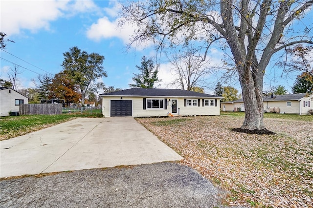 ranch-style home with a garage