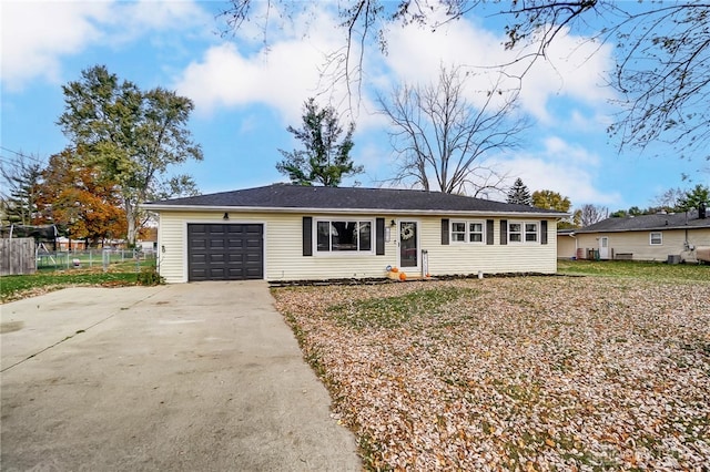 ranch-style home featuring a garage