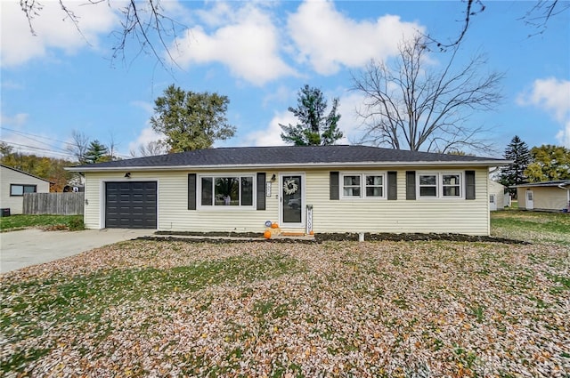 ranch-style house featuring a garage