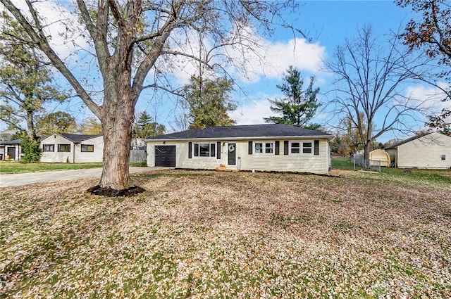 single story home featuring a garage