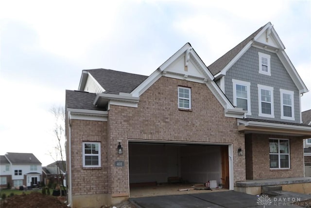 view of front of home with a garage