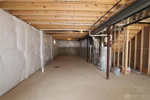 basement featuring heating unit and gas water heater