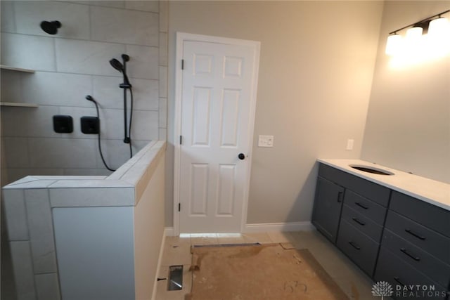 bathroom with walk in shower and washer / clothes dryer