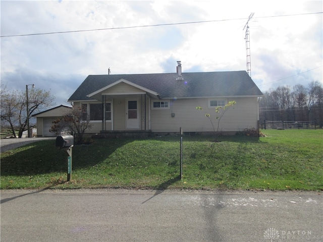 ranch-style house with a front lawn and a garage