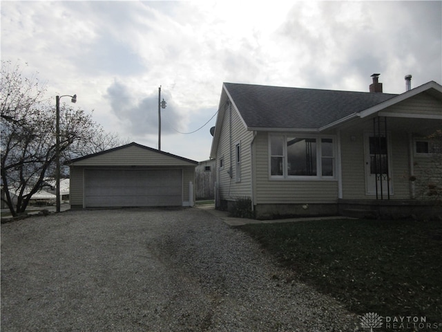 view of front of house featuring an outbuilding and a garage