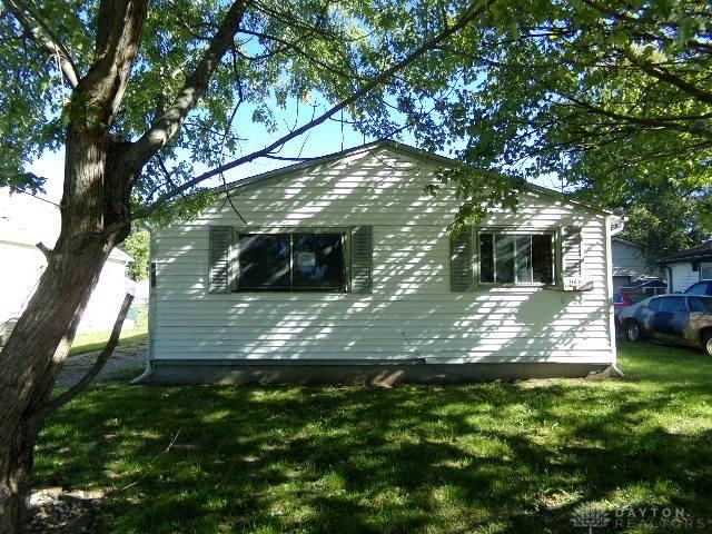 view of home's exterior with a yard