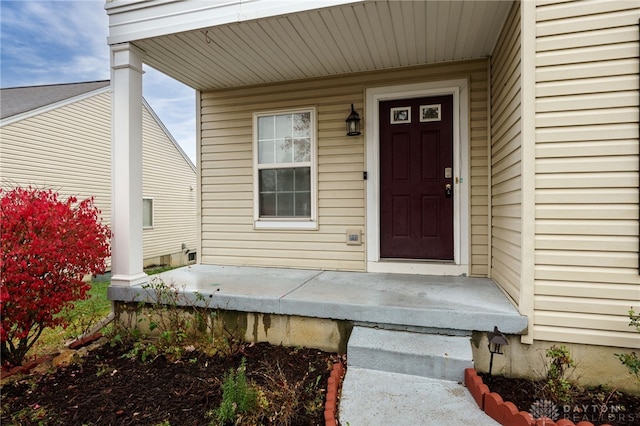 entrance to property with a porch