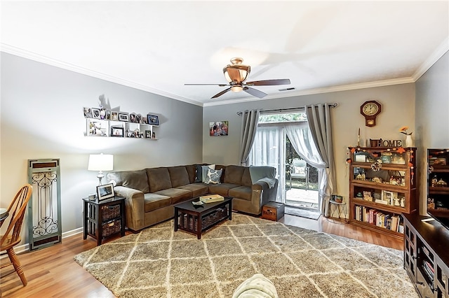 living room featuring crown molding, hardwood / wood-style flooring, and ceiling fan