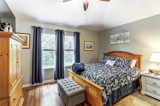 bedroom featuring wood-type flooring and ceiling fan