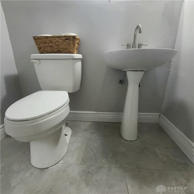 bathroom featuring toilet