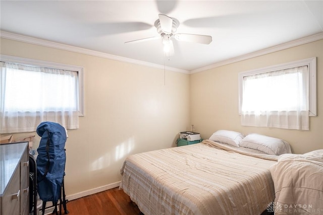 bedroom with multiple windows, crown molding, dark hardwood / wood-style floors, and ceiling fan