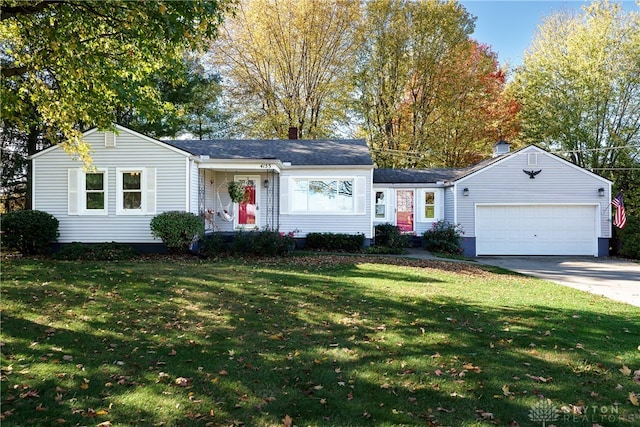 ranch-style home featuring a front yard and a garage