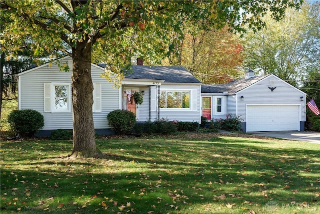 ranch-style home with a front yard and a garage