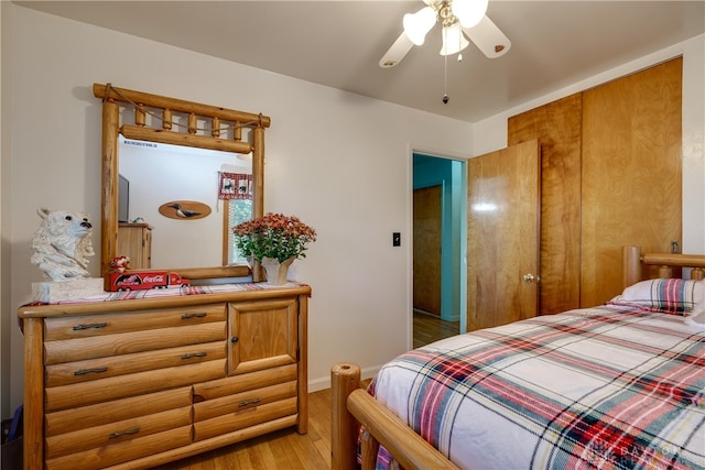 bedroom featuring ceiling fan and light hardwood / wood-style floors