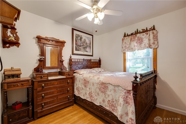 bedroom featuring light wood-type flooring and ceiling fan