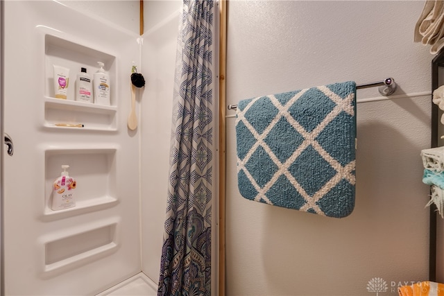 bathroom with walk in shower