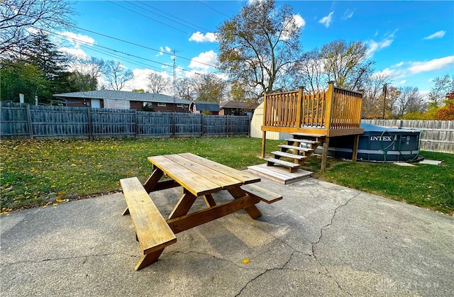 exterior space with a swimming pool side deck