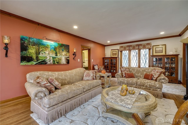 living room with light wood-type flooring and crown molding