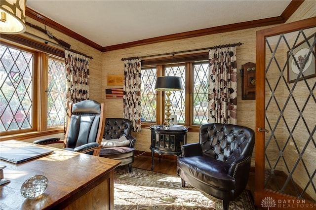 living area featuring ornamental molding and hardwood / wood-style floors