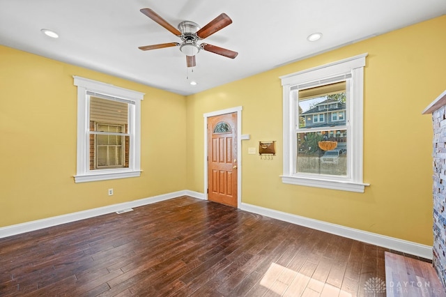 entrance foyer featuring ceiling fan and dark hardwood / wood-style floors