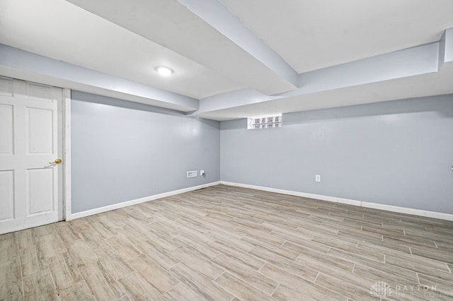 basement featuring light hardwood / wood-style floors