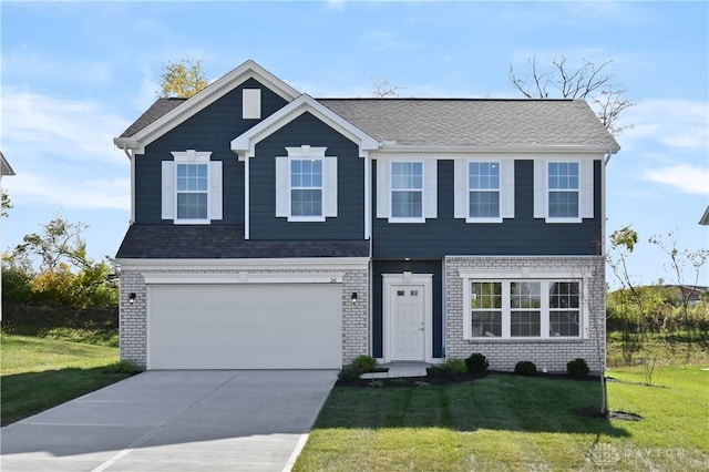 view of front of home with brick siding, a garage, concrete driveway, and a front yard