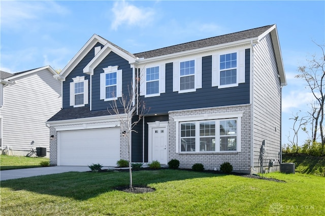 view of front of property featuring central air condition unit, a front lawn, and a garage