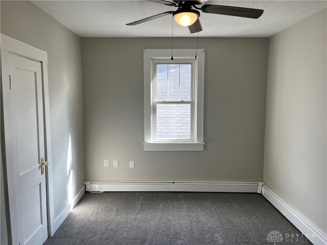 unfurnished room featuring a textured ceiling, carpet, a baseboard radiator, and ceiling fan