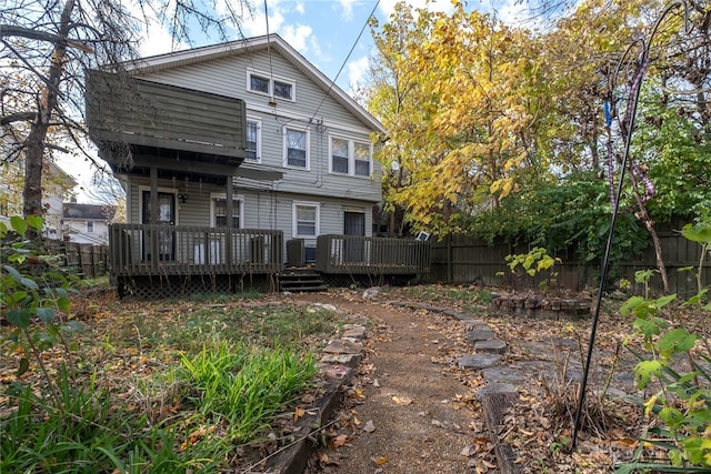 rear view of house with a deck