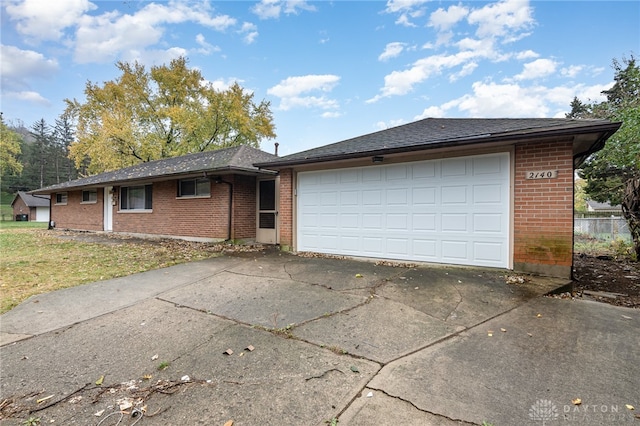 single story home with a garage