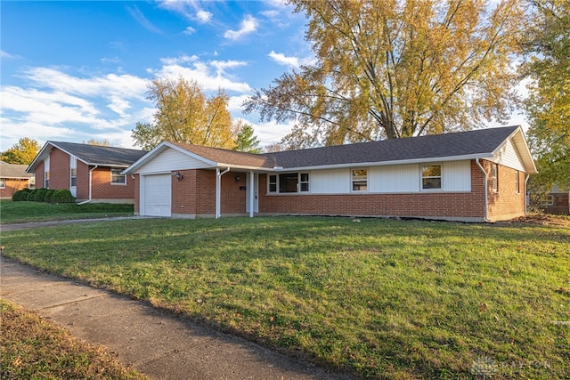 ranch-style home featuring a garage and a front yard