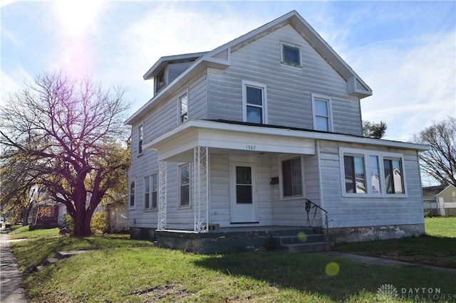 view of front of home with a front lawn