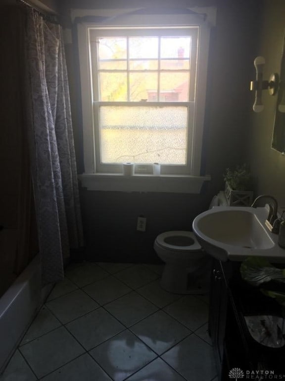 full bathroom with tile patterned flooring, vanity, shower / bath combination with curtain, and toilet