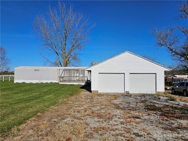 detached garage with fence