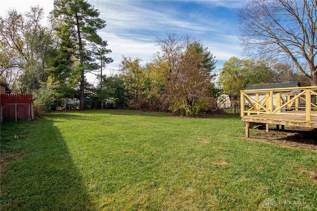 view of yard featuring a deck