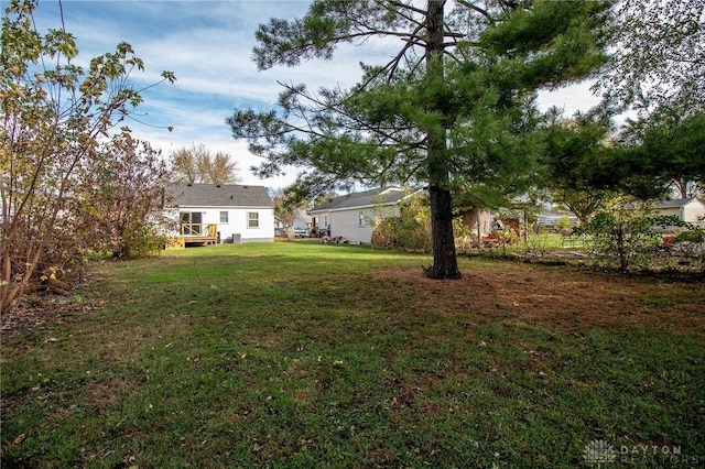 view of yard featuring a deck