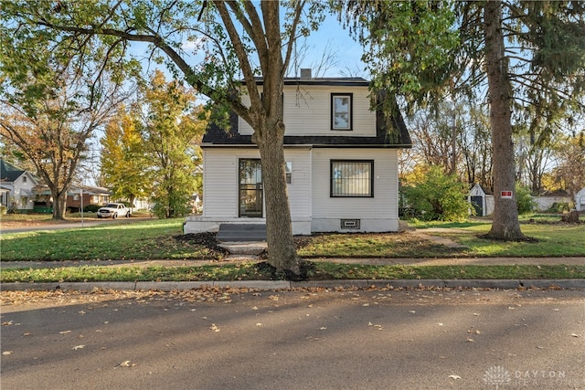 view of front of house with a front lawn