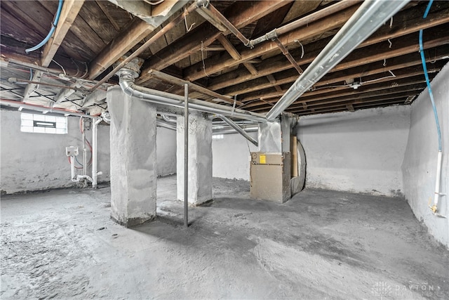 basement featuring heating unit