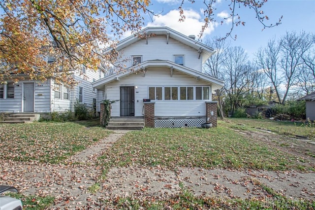 view of front of home with a front yard