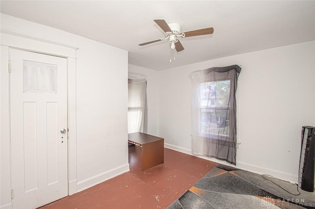 interior space featuring ceiling fan