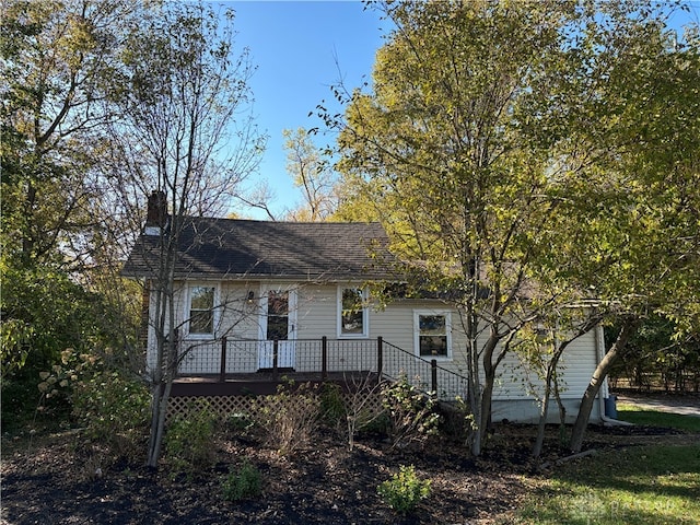 view of front of property with a deck