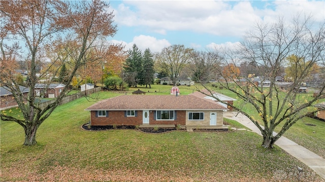 ranch-style house with a front yard