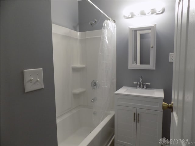 bathroom featuring vanity and shower / bath combo