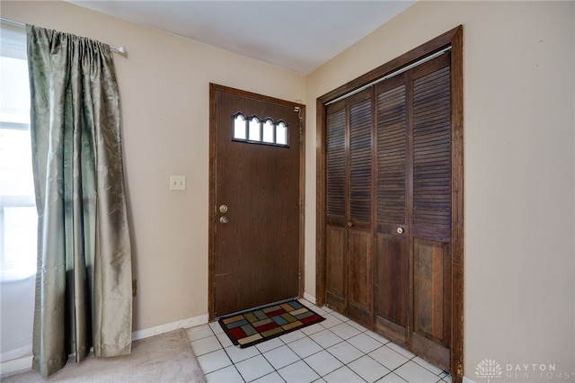 view of tiled foyer entrance