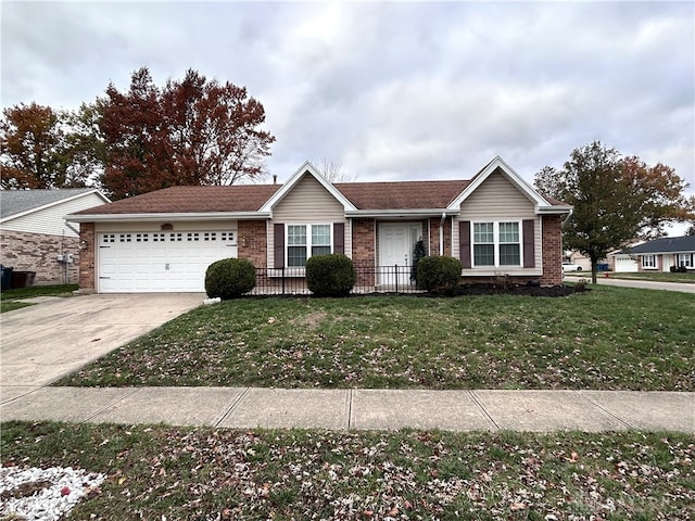 ranch-style home featuring a garage and a front lawn