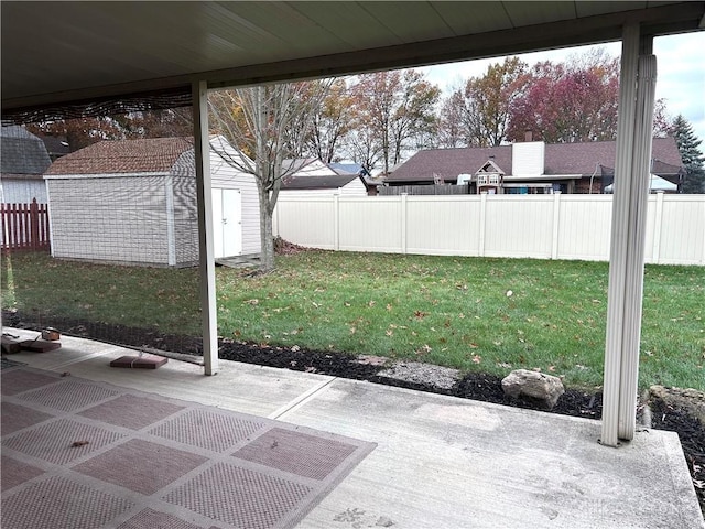 view of patio / terrace featuring a shed